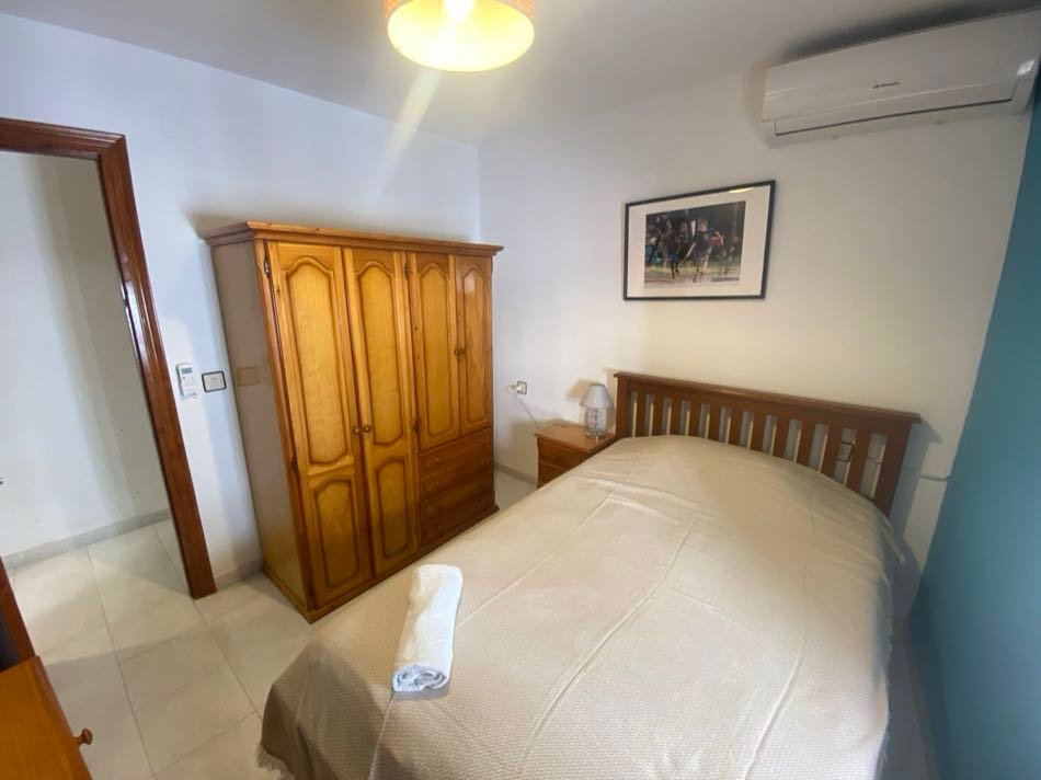 Bedroom at Piso 2, Pisos Baza